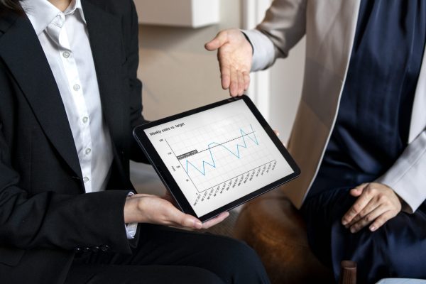 business-people-working-with-ipad-high-angle